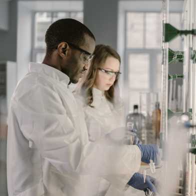 a man and woman in a lab