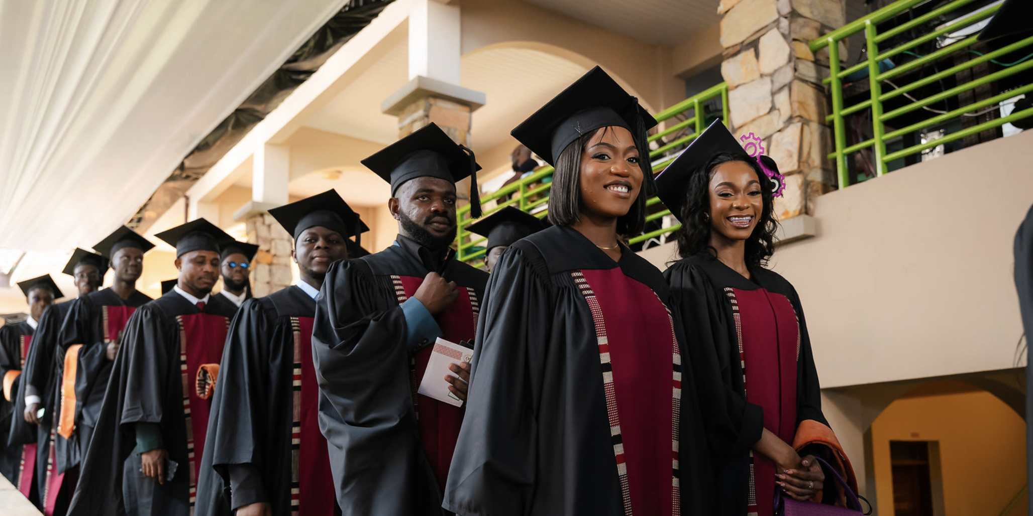 A group of students wearing graduation caps and robes